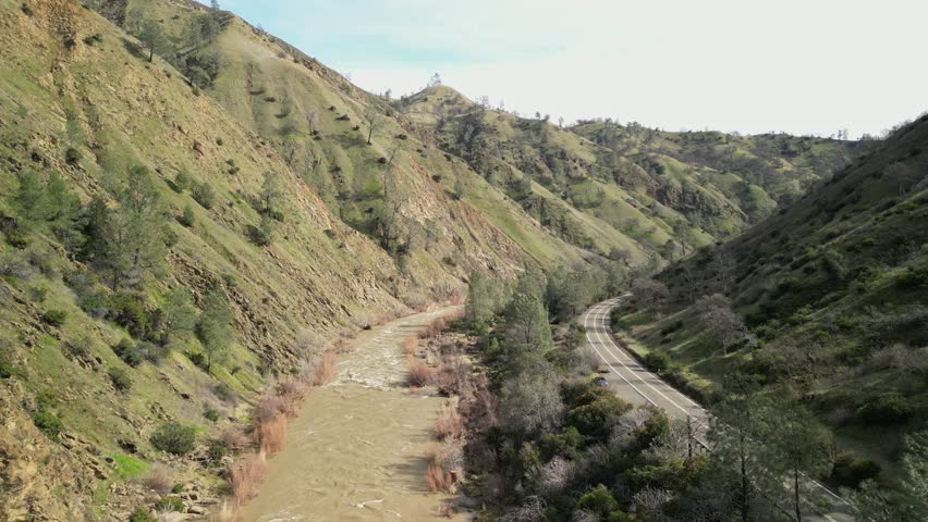 Cache Creek’s winding course is displayed from above, offering a unique view of its natural landscape.