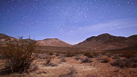 Amazing Death Valley National Park Desert Moonlit Timelapse Under Galaxy Stars.