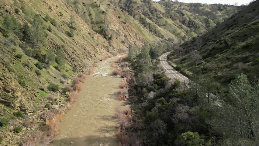 The vast landscape of Rumsey unfolds as the drone follows Cache Creek’s gentle curves and changing terrain.