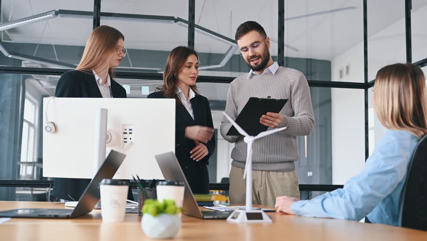 Active discussion. Business people are working in the office. - Powered by Shutterstock - Get 15% off with code: PIKWIZARD15