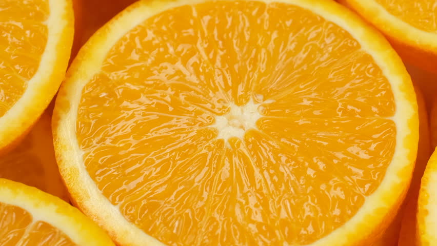 Zoom frame orange fruit slices, close up