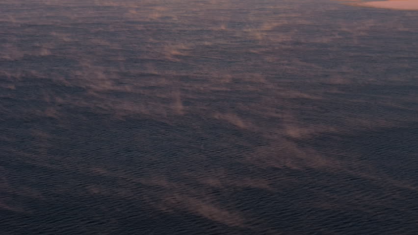 Fog Rising Over The Cold Water Of Lake Laberge In Winter.