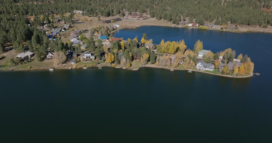 A scenic aerial view of Pagosa Springs, Colorado, showcasing a peaceful lakeside area.
