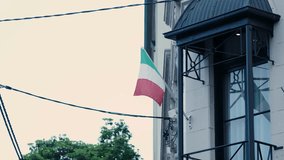 Italian Flag Slowly Moving In Soft Wind During Cloudy Day. Slow Motion Shot - Powered by Shutterstock - Get 15% off with code: PIKWIZARD15