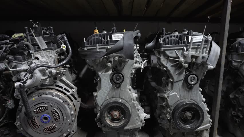 Used car engines stored in a junkyard. Car spare parts concept.