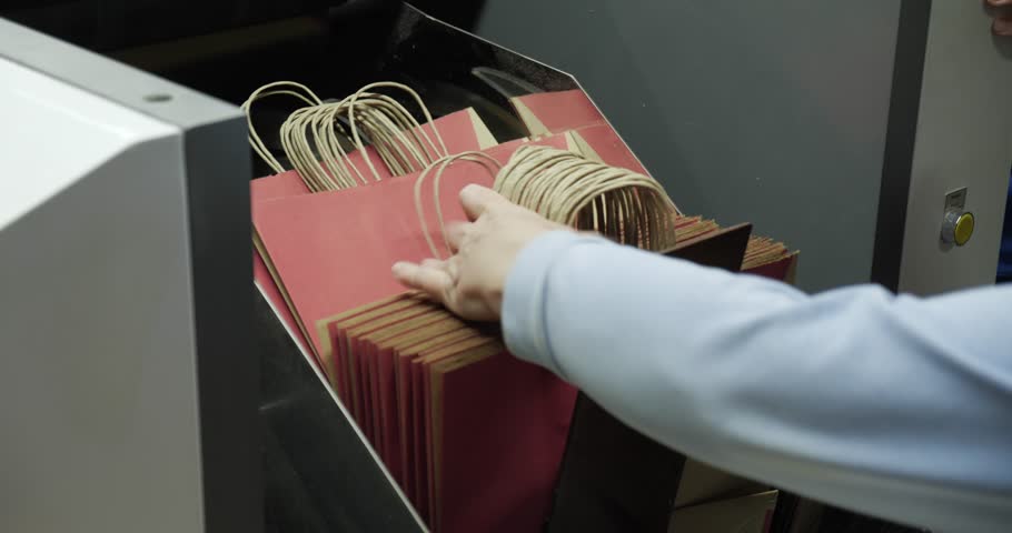 Production line for the production of paper bags. Robotic production concept.
