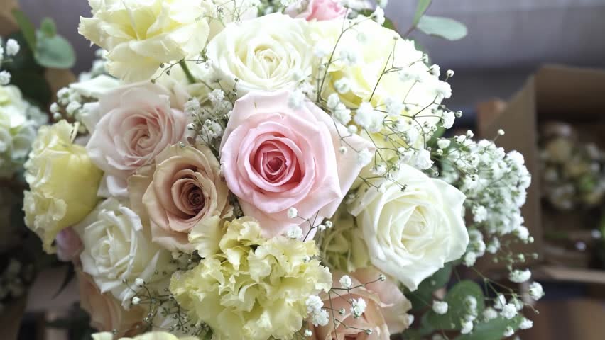Wedding Bouquet Of Rose With Baby's Breath. - closeup shot