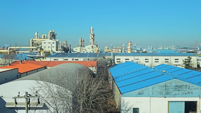 Industrial Complex At Port Of Incheon On Wolmi Island In South Korea. elevated trucking shot