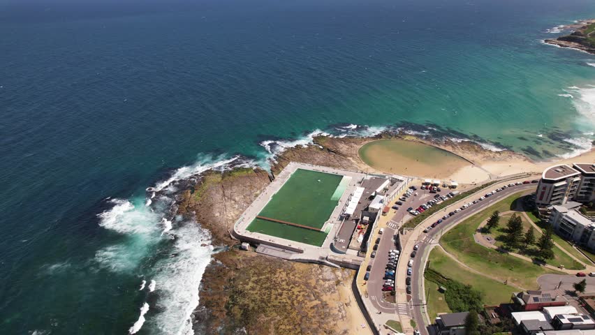 Newcastle Ocean Baths And Newcastle Canoe Pool In Shortland Esplanade, Newcastle, NSW, Australia - Aerial Drone Shot