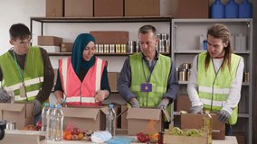 Ramadan Food Donation Prep. Community Aid: Muslim Volunteers in Action - Powered by Shutterstock - Get 15% off with code: PIKWIZARD15