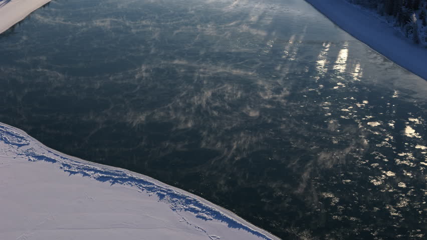 Reflections Over Lake Laberge In Yukon River, North of Whitehorse, Yukon Canada. Aerial Shot