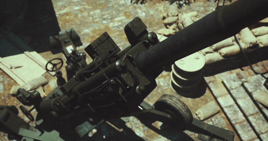 Heavy artillery is positioned strategically on a battlefield with sandbags and debris scattered around. The equipment appears ready for use, highlighting the intensity of the situation.