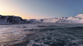 Aerial drone gliding and flying over dark cold ocean sea water with mountains in the background during sunset or sunrise with orange sky in Norway during winter. Drone reaches the beach dark shoreline - Powered by Shutterstock - Get 15% off with code: PIKWIZARD15