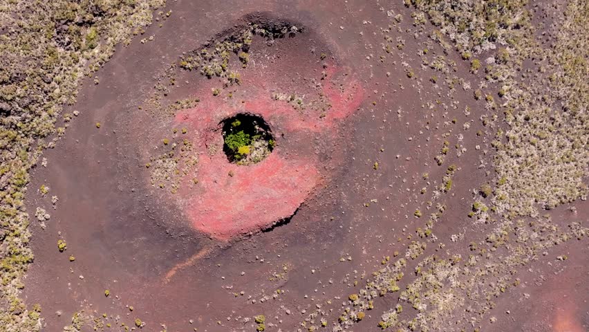 France, Réunion Island, Puys Ramond Craters. Aerial view of volcanic formations. Rotation over