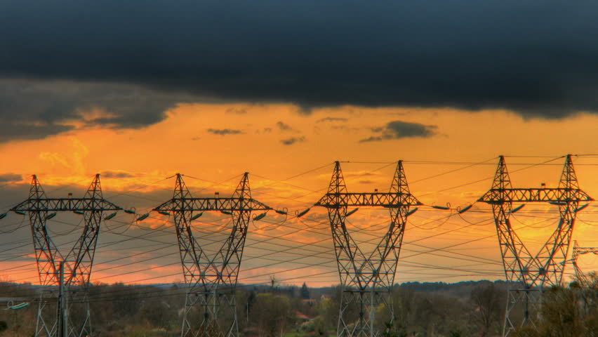 Sunset over electrical pylons, HD time lapse clip, high dynamic range imaging