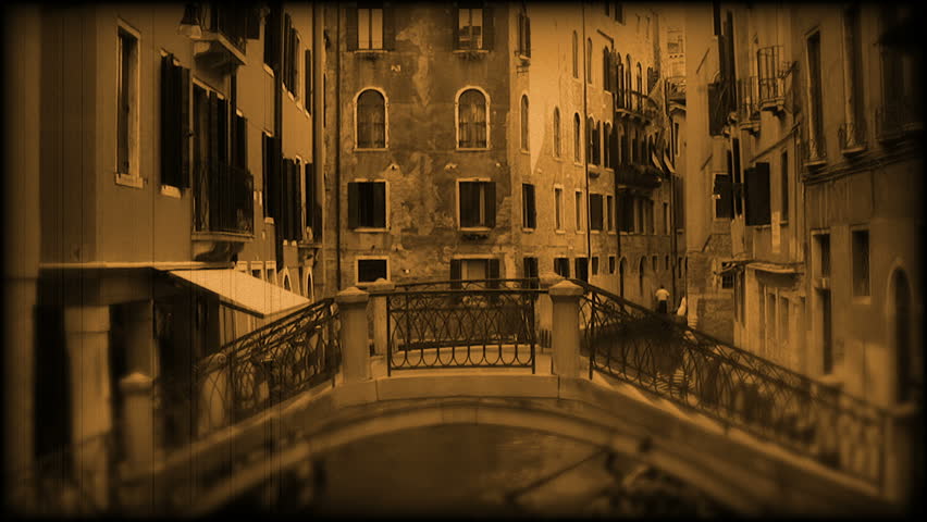 Italy. Venice. Gondolas float on the canal. old film style. 