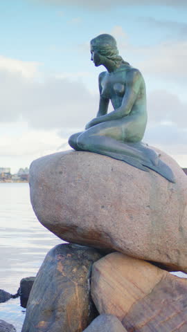 Copenhagen , Denmark - 02 07 2024: Static view of The Little Mermaid sculpture next to Langelinie pier