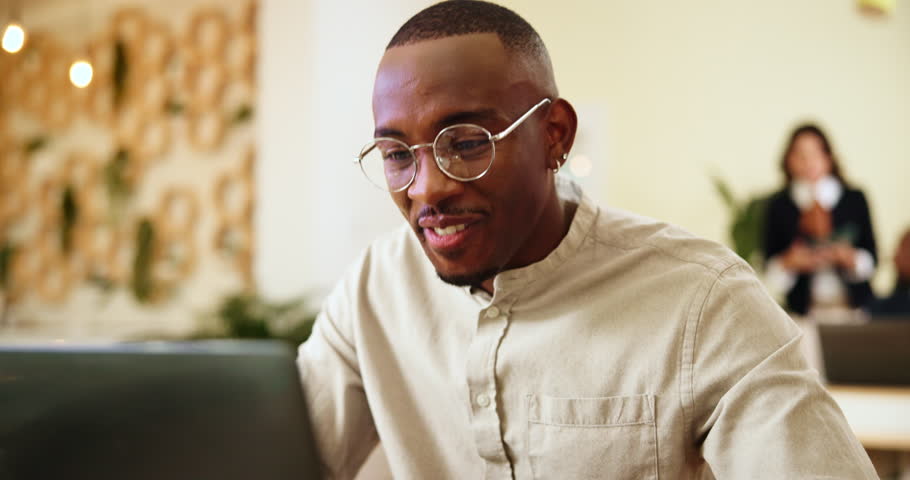 Excited man, laptop and winning with fist pump for good news, celebration or confirmation at travel agency. Male person, consultant or happy agent with smile on computer for success or deal at office