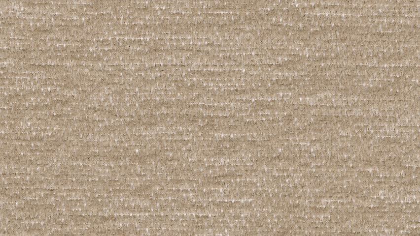 A macro shot reveals interlaced fibers forming a refined light brown textile