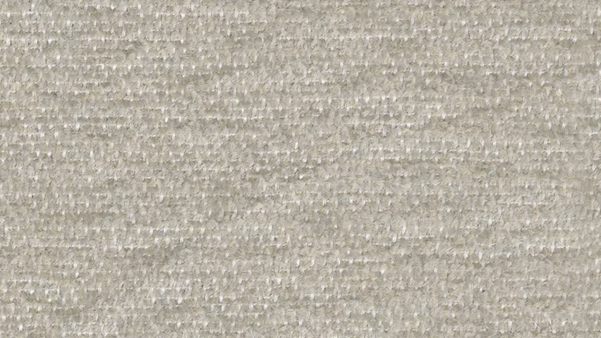 A slow zoom shot reveals knit details and white spots on grey fabric