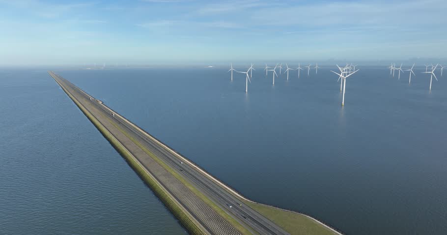Afsluitdijk, road in endless water, between Friesland and North Holland. Dutch icon. Aerial drone view.