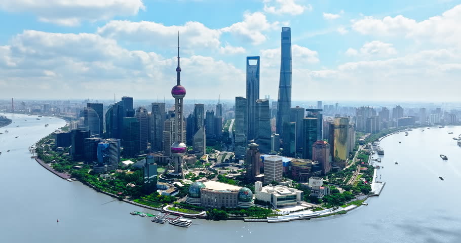 Aerial view of Shanghai city skyline with blue sky and white cloud in China