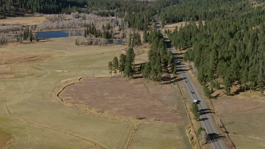 Wolf Creek Valley near Pagosa Springs, Colorado, showing open fields, roads, and nature