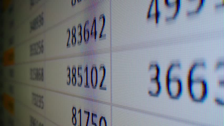 Close-up of financial cash flow data on PC screen. Mortgage payment sheet schedule. Loan fee