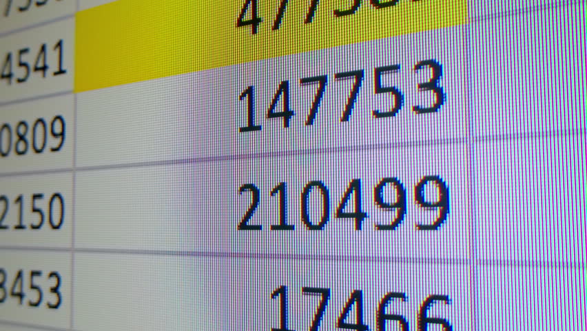 Close-up of financial cash flow data on PC screen. Mortgage payment sheet schedule. Loan fee