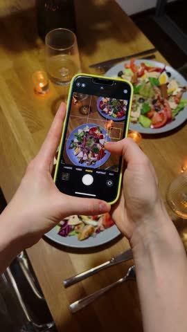 Vertical Screen: Content creator focusing on delicious meals, culinary blogger showcasing gourmet food, engaging audience through artistic food photography, building a personal brand with food posts.