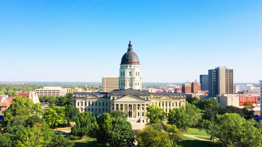 Slow approach of Kansas State Capitol, in Topeka. The Kansas Statehouse, is the building housing the executive and legislative branches of government for the U.S. state of Kansas