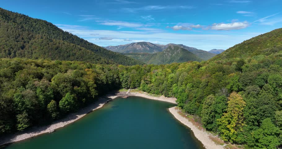 Aerial pedestal shot above a calm lake in the Biogradska Gora national park in Montenegro.