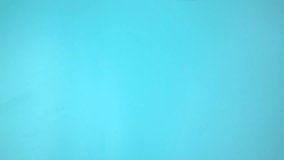 Footage video 4k. Hands holding purple or violet ribbon on blue. Pancreatic Cancer ,Testicular Cancer Awareness, Cancer Survivor, Leiomyosarcoma, World Cancer Day. Healthcare, insurance concept. - Powered by Shutterstock - Get 15% off with code: PIKWIZARD15