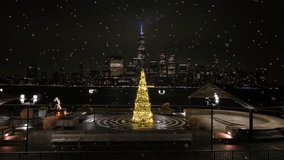 Snowy flurries falling from night over american town. Lighting christmas tree and illuminated one World Trade Center in distance. Aerial approaching shot. Christmas time in New York City, USA. - Powered by Shutterstock - Get 15% off with code: PIKWIZARD15