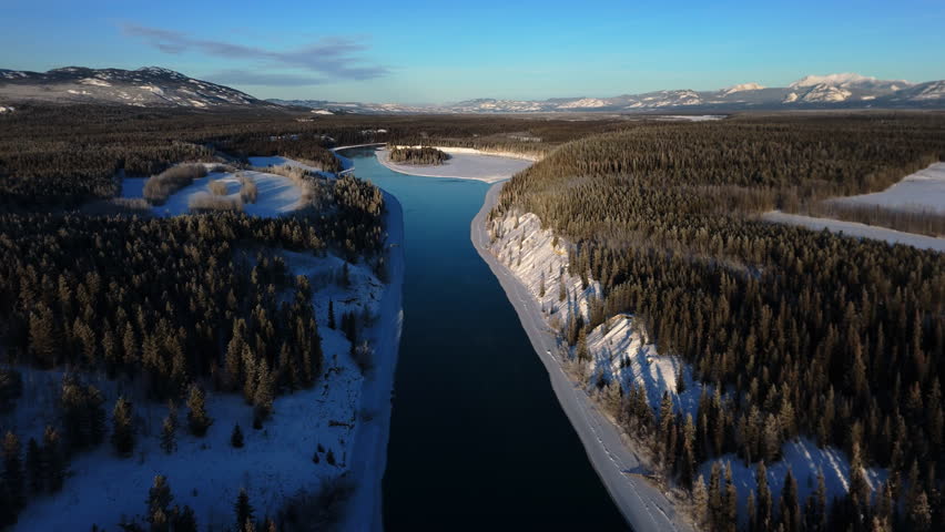 Yukon River And Lake Laberge During Winter In Canada - Drone Shot
