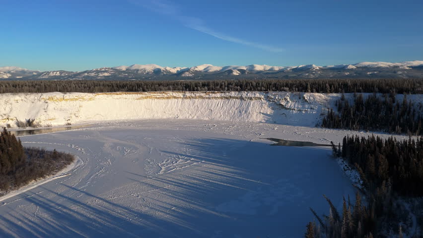 Lake Laberge During Winter In Yukon, Canada - Aerial Shot