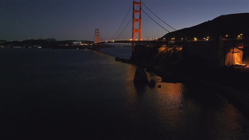 Golden Gate Bridge San Francisco California aerial drone sunset sunrise evening purple sky dusk Bay Area Lime Point Lighthouse Point Cavillo lights Sausalito Dana Bowers Needles forward pan motion