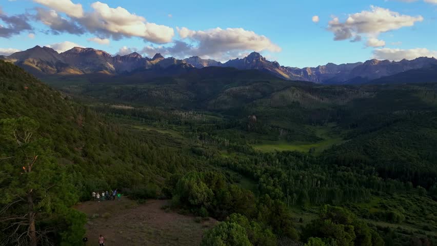 Ridgway Colorado summer Mount Sneffels Wilderness aerial drone sunset golden hour Aspen Tree forest grove ranch farmland Montrose Telluride Dallas Divide San Juan Rocky Mountains forward pan up motion
