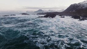 A Stormy Seascape Featuring a Rugged Coastline and Powerful Waves Crashing Rhythmatically - Powered by Shutterstock - Get 15% off with code: PIKWIZARD15
