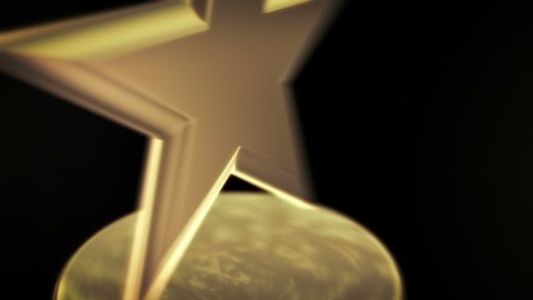 Gold Star Award - Spinning award statue in gold, ideal for any award ceremony with copy space at the end to put your own text or logo.