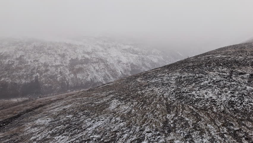 Foggy Slope Mountains Of Ogilvie In The Yukon Territory Of Northwestern Canada. Aerial Drone Shot