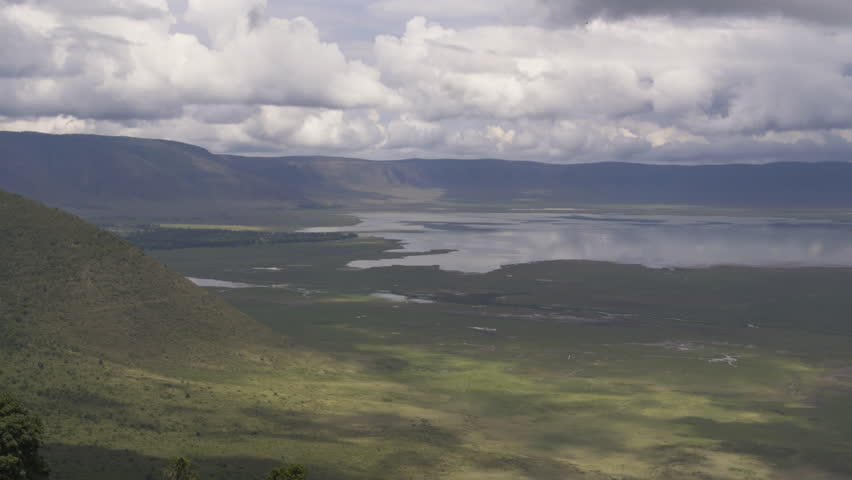 Wide view of the Ngorongoro Crater in Tanzania showcasing lush green landscapes