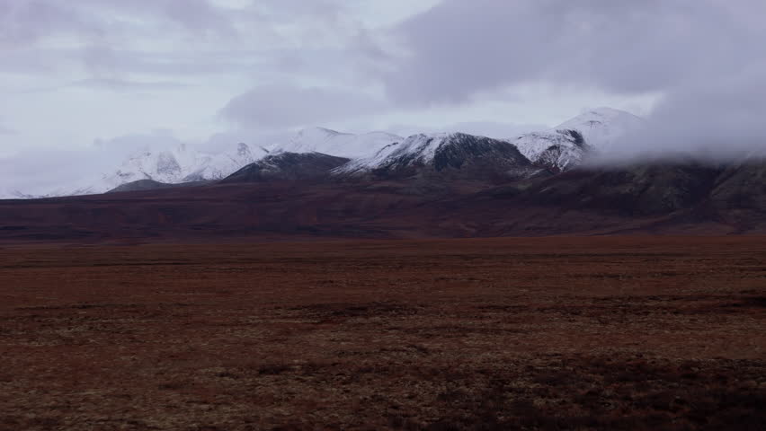 Snowy Mountain Range Of Ogilvie In Yukon, Canada - Drone Shot