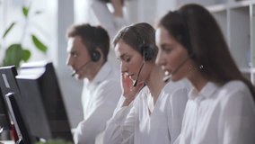 A dedicated and professional call center team is working together effectively and collaboratively - Powered by Shutterstock - Get 15% off with code: PIKWIZARD15