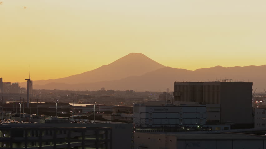 Mt. Fuji and Yokohama Skyline over the Industrial Area in Kawasaki City at Sunset (Timelapse | ZOOM OUT)