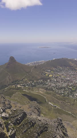 Cape town with table mountain and nearby islands in the distance, aerial view