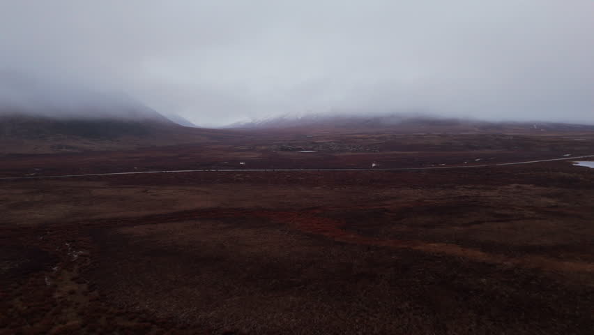 Dempster Highway And Surrounding Mountains On A Misty Day In Yukon, Canada - Drone Shot