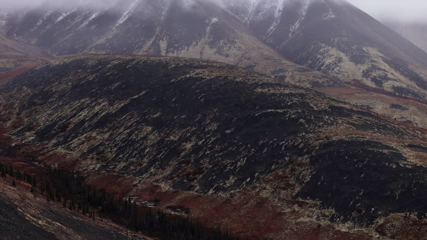 Wilderness Landscape Of Ogilvie Mountains In Yukon, Canada - Aerial Drone Shot