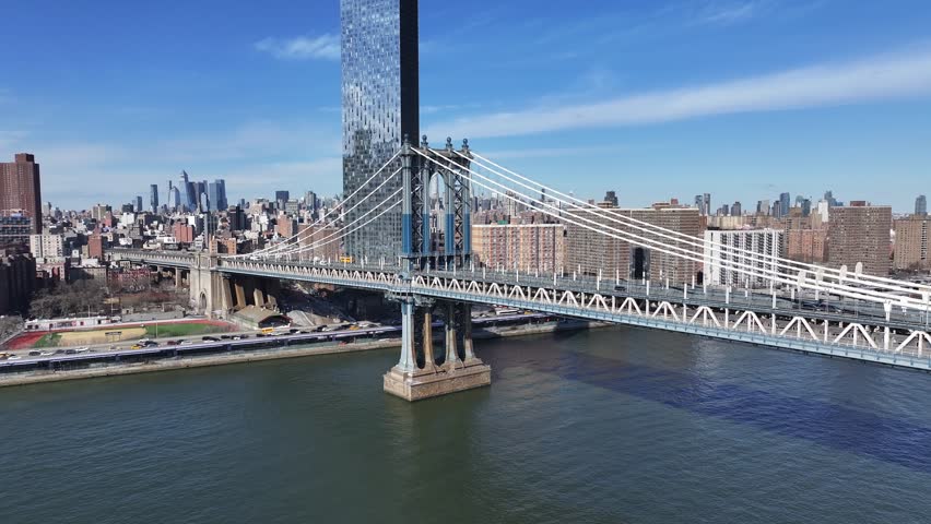 Manhattan Bridge At Manhattan In New York United States. Highrise Buildings Scenery. Cable Bridge Landscape. Manhattan Bridge At New York United States. Freeway Road Background.