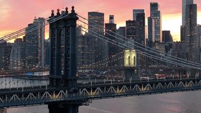 Manhattan Bridge At Manhattan In New York United States. Illuminated Downtown. Sunset City Landscape. Manhattan Bridge At New York United States. Brooklyn Bridge. - Powered by Shutterstock - Get 15% off with code: PIKWIZARD15